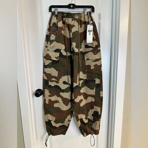 Good American Camouflage parachute Pants small will fit medium.
